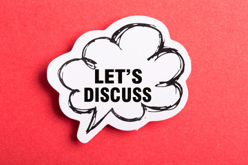 Let Us Discuss Speech Bubble Isolated On Red Background