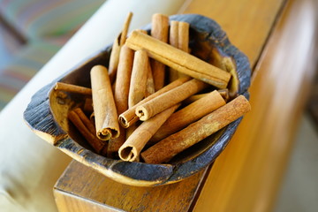 Bowl of fragrant dried cinnamon sticks