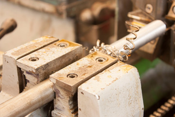 Scraps of spiral left over from the process that the threading machine makes when making a rope