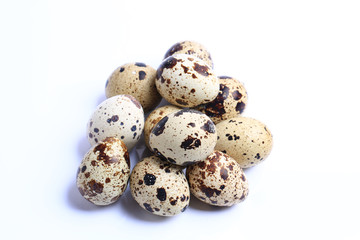 Obraz premium quail eggs isolated on white background
