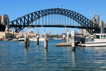 Sydney Harbour Bridge with Boats and Pier and City