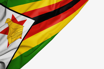 Zimbabwe flag of fabric with copyspace for your text on white background. - obrazy, fototapety, plakaty