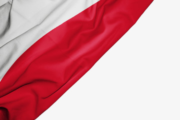 Obraz premium Poland flag of fabric with copyspace for your text on white background.