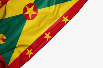 Grenada flag of fabric with copyspace for your text on white background.