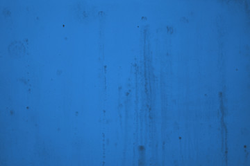 Black mold on a blue wall.
