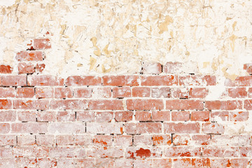 Red Old Weathered Brick Wall With Beaten Pieces Of Whitewash, Putty And Plaster. Fragment Of Wall Surface Of Historic Building With Chips, Cracks And Damages.