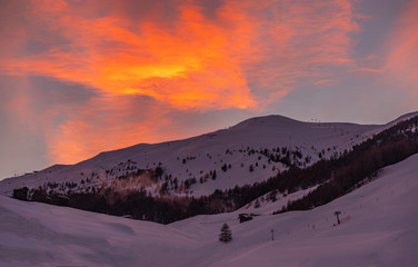 Evening Landscape in Livigno, Italy. Fantastic sunset with colorful sky.