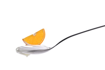 Plain yogurt on a spoon with fresh fruits on top isolated on white background