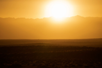 The sun peered over helan peak.