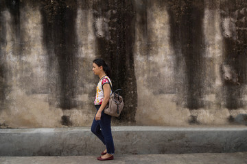 Portrait Asian women walk Carrying a backpack