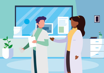 couple medicine workers in clinic reception