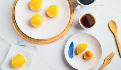 East asian afternoon tea food and drink Concept Flat lay mid-autumn festival ,Spring Roll pastry with nuts , salted eggs.