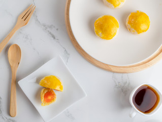 East asian afternoon tea food and drink Concept Flat lay mid-autumn festival ,Spring Roll pastry with nuts , salted eggs.