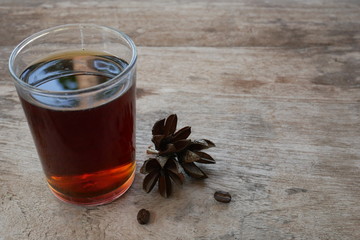 black coffee on wooden table background,sweet tea aroma fresh drink