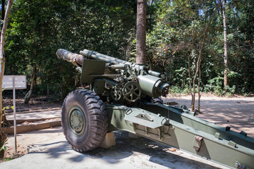 Front view of a 155mm Vietnam War artillery on display at Cu Chi Tunnels in Saigon, Vietnam.