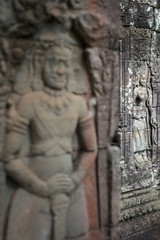 Fototapeta na wymiar Sculpture details at the beautiful Ta Prohm temple in Siem Reap, Cambodia