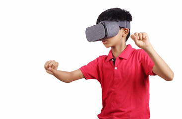 Naklejka premium Indian young boy wearing Virtual Reality Glasses, Playing video games
