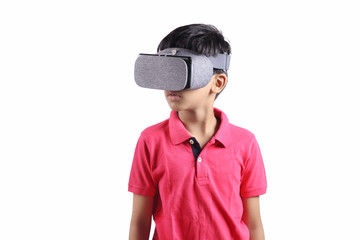 Indian young boy wearing Virtual Reality Glasses, Playing video games