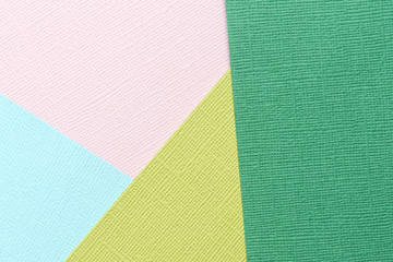 Pink, green, blue abstract paper background. Paper texture