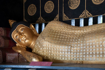 Chiang Mai Thailand, Reclining Buddha at Wat Chedi Luang with ornate robe