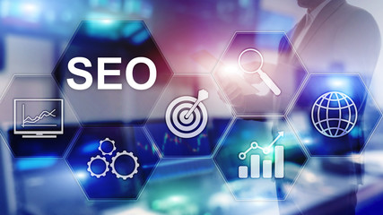 SEO - Search engine optimization, Digital marketing and internet technology concept on blurred background