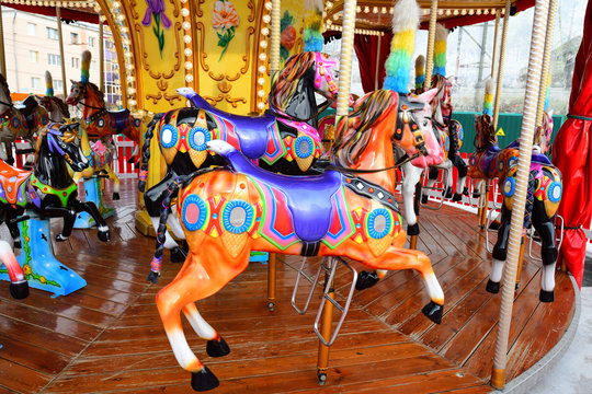 colored carousel with horses