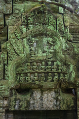Beautiful sculpture at the Ta Prohm temple ruins in Siem Reap, Cambodia