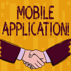 Writing note showing Mobile Application. Business concept for application software designed to run on a mobile device Businessmen Shaking Hands Form of Greeting and Agreement
