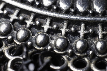 A steel chain background.