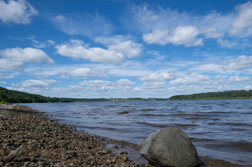 Cloudy sky over the river