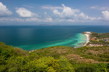 Beautiful aerial viewpoint tropical paradise Thailand island beach in the ocean and mountain forest with cloudy day sky landscape background