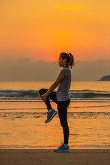 Fototapeta na wymiar Woman exercise on beach