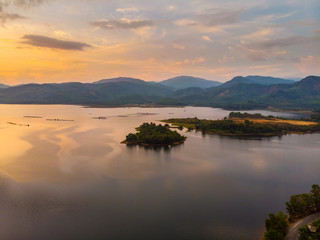 Silhouette lake sunset with colourful sky cloud