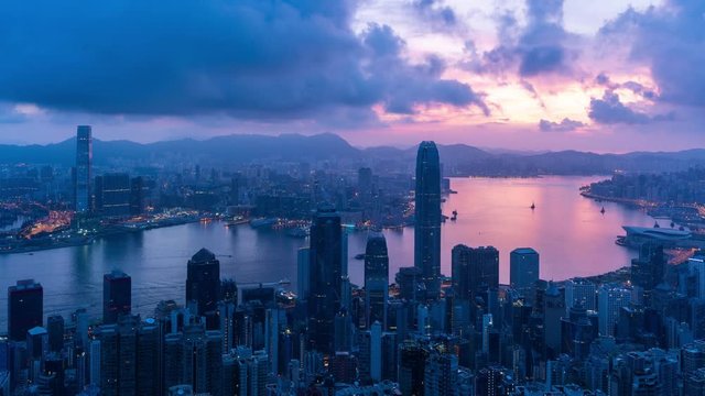 Time lapse of Hong Kong city downtown at sunrise, Victoria peak, Hong Kong