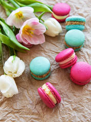 Colorful macaroons and tulips
