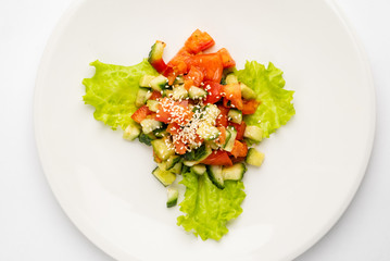 greek salad isolated on white plate