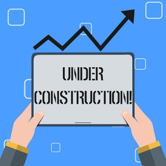 Handwriting text Under Construction. Conceptual photo project that is unfinished but actively being worked on Hand Holding Blank Screen Tablet under Black Progressive Arrow Going Upward