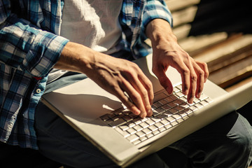 Hands on laptop