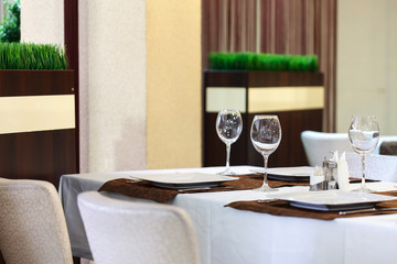 Tables set for meal in the restaurant
