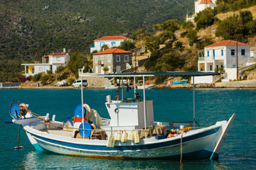 Fototapeta na wymiar Fishing boat in greek marina