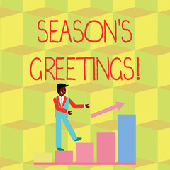 Handwriting text Season S Is Greetings. Conceptual photo Used as an expression of goodwill during festivities Smiling Businessman Climbing Colorful Bar Chart Following an Arrow Going Up