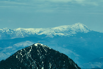 Fototapeta na wymiar winter landscapes of Ukrainian and Romanian Carpathians ,Snow Mountain with Blue Sky