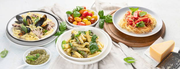Plates of pasta. Panorama, banner