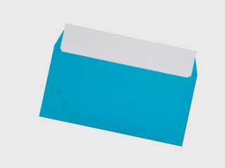 Blue envelope with a white sheet of paper on a white background