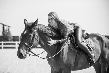 Woman and horse, lady have a hobby time, riding. Horses concept 