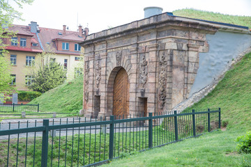 Fototapeta na wymiar City Prague, Czech Republic. Old building in park teritory. old walls and architecture. Travel photo 2019.