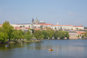 Fototapeta na wymiar City Prague, Czech Republic. View to the river and bridges from river Vltava. Spring. 2019. 24. April. Travel photo.