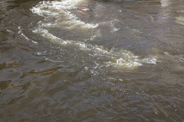  the surface of the water after passing boats  