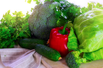 Fresh vegetables and greens for salad . 