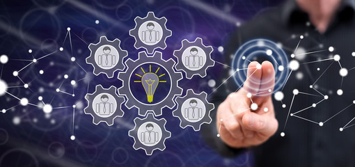 Man touching a teamwork idea concept
